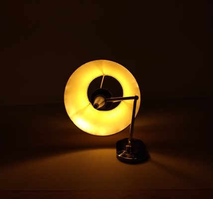 Photo "Table lamp made of cracked glass and brass Retro style living room"