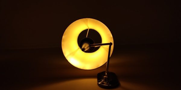 Photo "Table lamp made of cracked glass and brass Retro style living room"