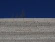 Photo travertine stone block wall wash light
